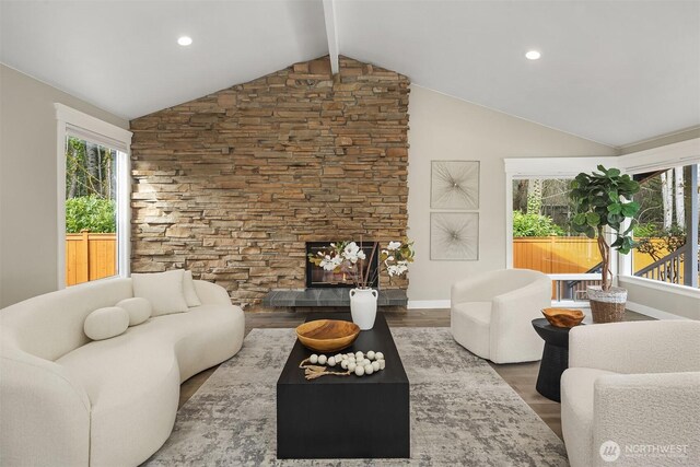 13050 SE 21st Pl, Bellevue, WA 98005 - living area with wood finished floors, baseboards, recessed lighting, and a stone fireplace