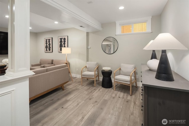 13050 SE 21st Pl, Bellevue, WA 98005 - living room with light wood-style flooring, recessed lighting, and baseboards