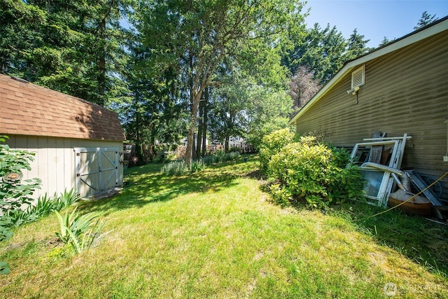 19308 8th St E, Spanaway, WA 09387 - view of green lawn featuring a storage unit