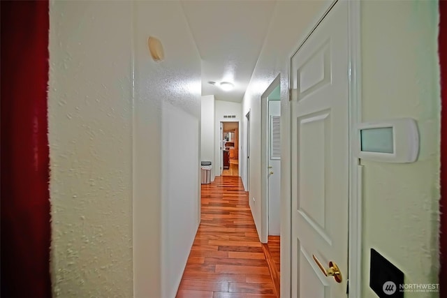 19308 8th St E, Spanaway, WA 09387 - hallway with wood finished floors