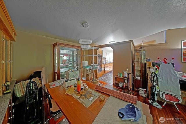 19308 8th St E, Spanaway, WA 09387 - dining space with wood finished floors and a textured ceiling