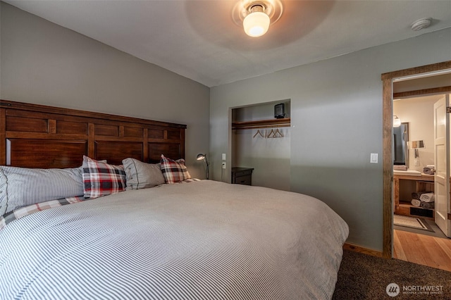 bedroom featuring a closet, ceiling fan, and wood finished floors