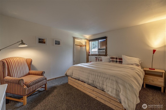 carpeted bedroom with cooling unit and baseboards