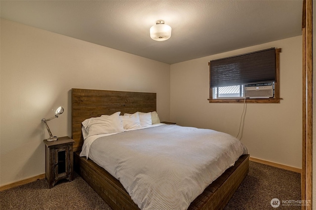 bedroom featuring carpet and baseboards