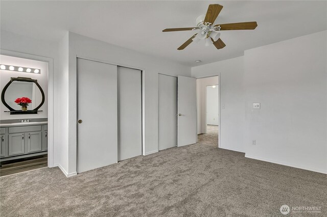 1108 200th Street Ct E, Spanaway, WA 98387 - unfurnished bedroom featuring carpet floors, a sink, ensuite bathroom, and a ceiling fan