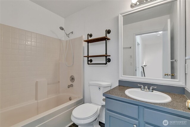 1108 200th Street Ct E, Spanaway, WA 98387 - full bathroom featuring toilet, vanity, and tub / shower combination