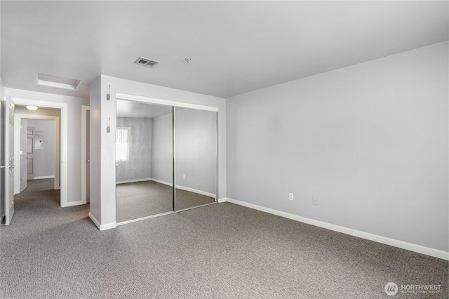 2900 W Marina Dr Unit 303, Moses Lake, WA 98837 - unfurnished bedroom with carpet, a closet, and baseboards