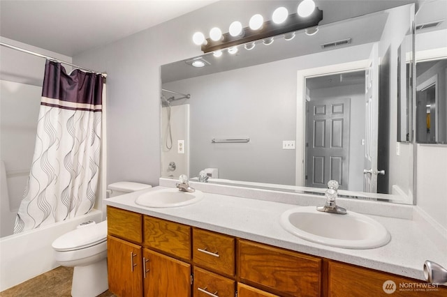 2900 W Marina Dr Unit 303, Moses Lake, WA 98837 - full bathroom featuring toilet, shower / bathtub combination with curtain, and double vanity