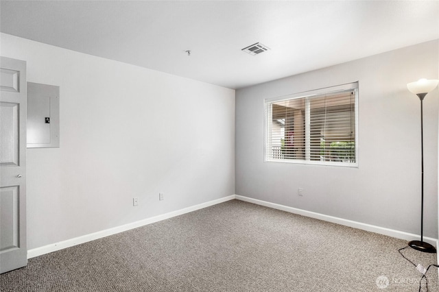 2900 W Marina Dr Unit 303, Moses Lake, WA 98837 - carpeted spare room with electric panel, baseboards, and fire sprinkler in ceiling