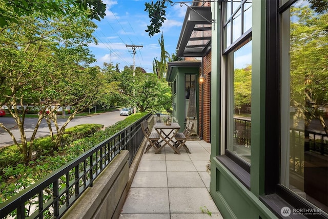 balcony featuring stairs