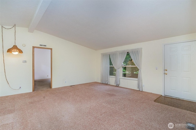 unfurnished living room with carpet flooring