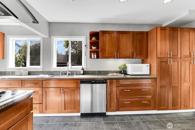 kitchen with dishwasher, a sink, white microwave, brown cabinets, and open shelves
