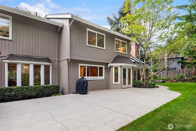 4816 118th Ave NE, Kirkland, WA 98033 - rear view of property with a patio, a shingled roof, and french doors