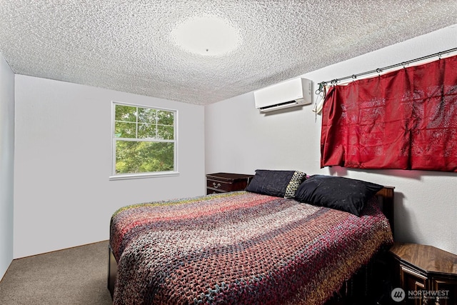 714 S 43rd St, Tacoma, WA 98418 - bedroom featuring a wall mounted AC, carpet flooring, and a textured ceiling