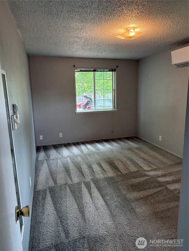 714 S 43rd St, Tacoma, WA 98418 - spare room featuring carpet and a textured ceiling
