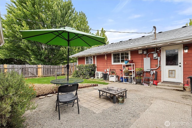714 S 43rd St, Tacoma, WA 98418 - view of patio with an outdoor fire pit and entry steps