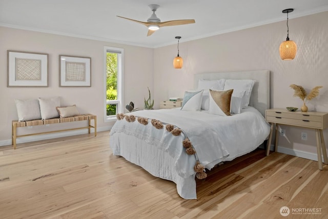 725 1st St S Unit 104, Kirkland, WA 98033 - bedroom with crown molding, light wood-type flooring, and baseboards