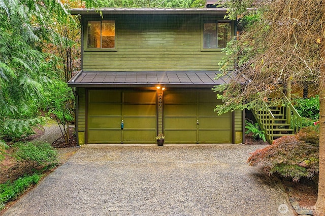 5471 NE Foster Rd, Bainbridge Island, WA 98110 - garage featuring driveway