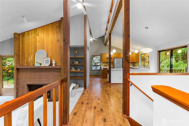 5471 NE Foster Rd, Bainbridge Island, WA 98110 - corridor featuring light wood finished floors and wood walls