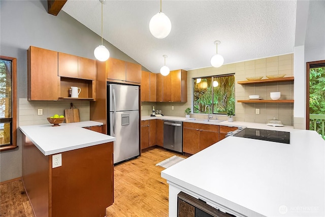 5471 NE Foster Rd, Bainbridge Island, WA 98110 - kitchen with stainless steel appliances, open shelves, backsplash, brown cabinets, and lofted ceiling