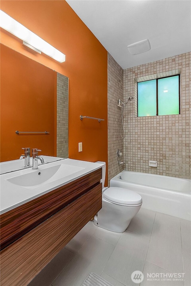 5471 NE Foster Rd, Bainbridge Island, WA 98110 - full bathroom featuring  shower combination, toilet, tile patterned floors, and vanity