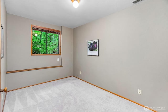 5471 NE Foster Rd, Bainbridge Island, WA 98110 - carpeted spare room featuring baseboards