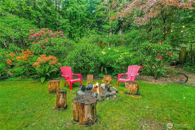 5471 NE Foster Rd, Bainbridge Island, WA 98110 - view of grassy yard with a fire pit