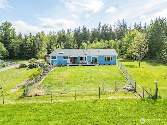399 Pike Pl, Sequim, WA 98382 - back of house featuring a deck and a wooded view