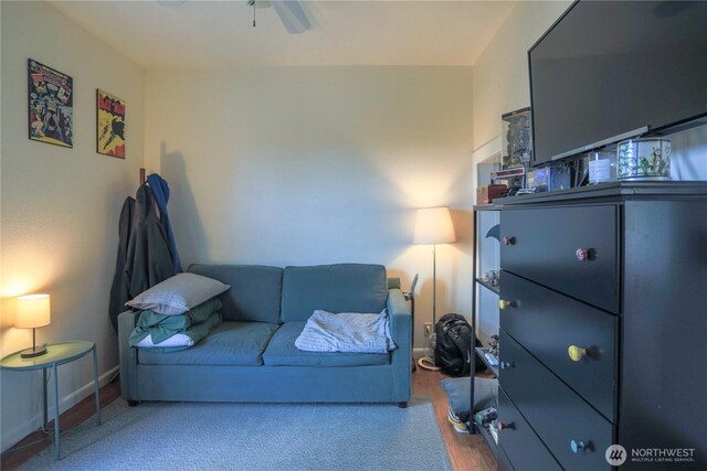 315 SW C St, Tumwater, WA 98512 - living room featuring a ceiling fan, wood finished floors, and baseboards