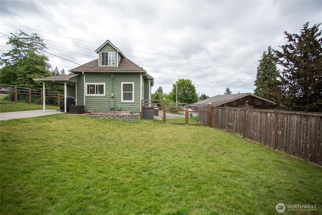 315 SW C St, Tumwater, WA 98512 - rear view of house featuring a shingled roof
