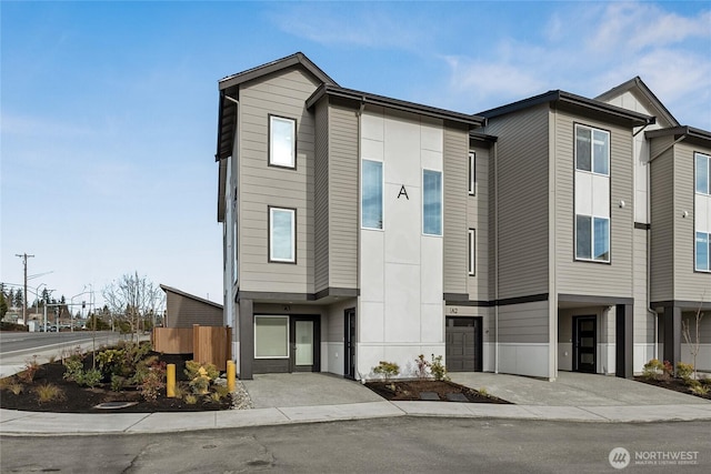 16723 Alderwood Mall Pkwy Unit E2, Lynnwood, WA 98037 - view of front of home with a carport