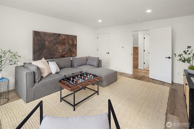 335 NW 47th St Unit B, Seattle, WA 98107 - living area featuring wood finished floors, baseboards, and recessed lighting