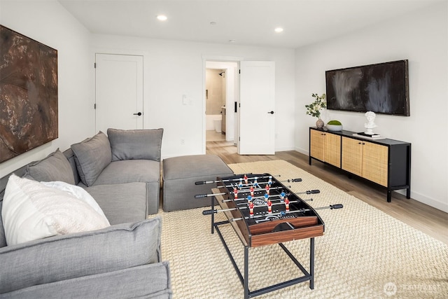 335 NW 47th St Unit B, Seattle, WA 98107 - living room featuring wood finished floors, recessed lighting, and baseboards