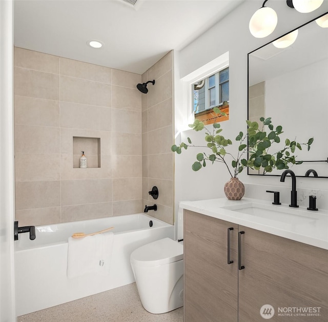 335 NW 47th St Unit B, Seattle, WA 98107 - full bathroom featuring speckle patterned floor, shower / bath combination, toilet, vanity, and recessed lighting
