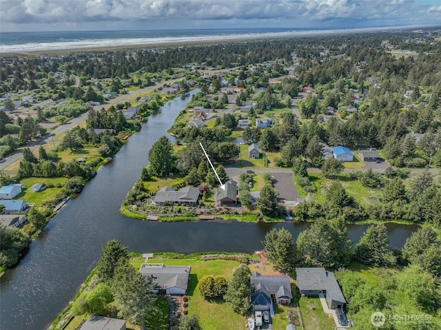 575 Kahkwo Ct SE, Ocean Shores, WA 98569 - aerial view of property and surrounding area featuring a large body of water and nearby suburban area