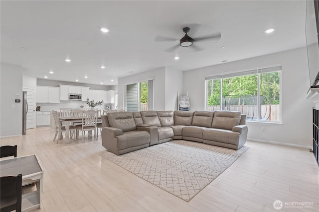 1194 Panoramic Loop, Bremerton, WA 98312 - living area featuring ceiling fan, light wood finished floors, recessed lighting, and baseboards