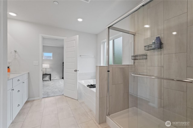 1194 Panoramic Loop, Bremerton, WA 98312 - bathroom featuring a garden tub, a stall shower, tile patterned flooring, vanity, and recessed lighting