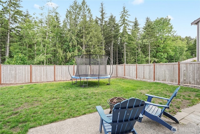 1194 Panoramic Loop, Bremerton, WA 98312 - view of yard featuring a trampoline and an outdoor fire pit