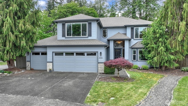 view of front of property featuring a shingled roof, driveway, stone siding, and a garage