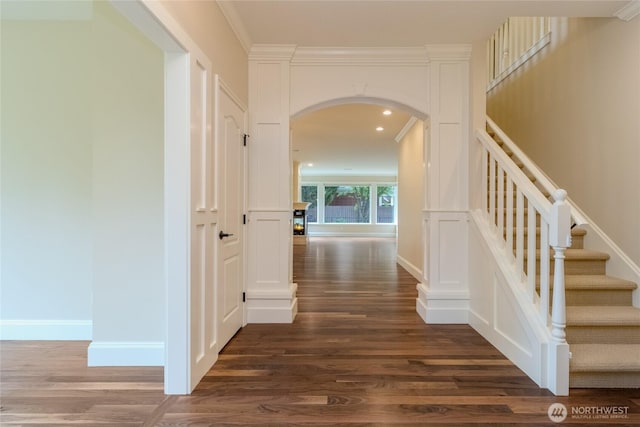 711 SE Pheasant Run, College Place, WA 99324 - hallway with arched walkways, dark wood-style floors, stairs, recessed lighting, and baseboards