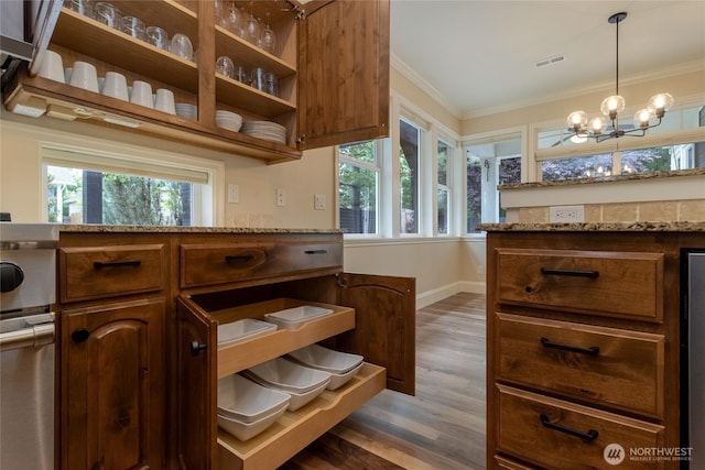 711 SE Pheasant Run, College Place, WA 99324 - kitchen with crown molding, dark wood-style flooring, open shelves, a chandelier, and baseboards