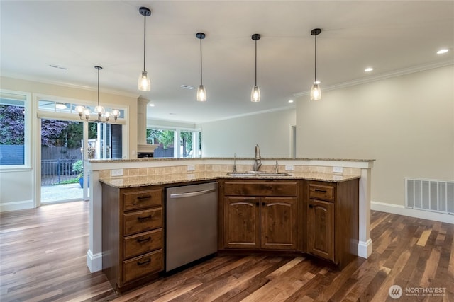 711 SE Pheasant Run, College Place, WA 99324 - kitchen with dishwasher, a sink, dark wood-style floors, crown molding, and baseboards
