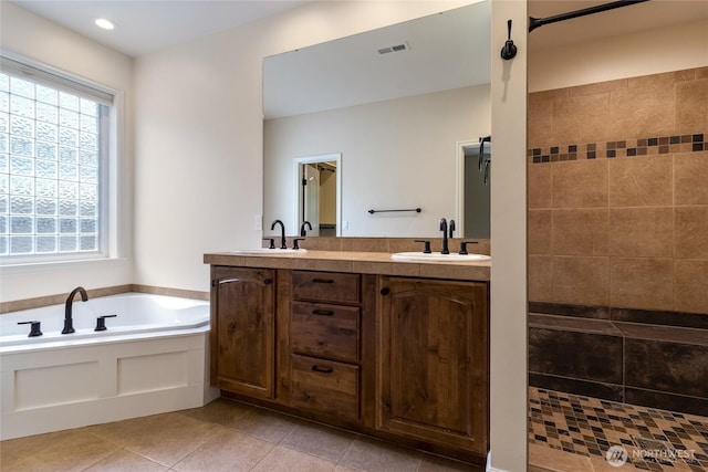 711 SE Pheasant Run, College Place, WA 99324 - full bathroom featuring a garden tub, tile patterned floors, double vanity, tiled shower, and recessed lighting