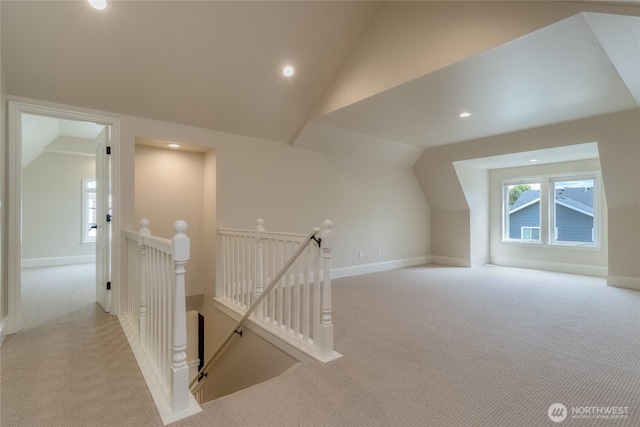 711 SE Pheasant Run, College Place, WA 99324 - bonus room featuring light colored carpet, lofted ceiling, baseboards, and recessed lighting