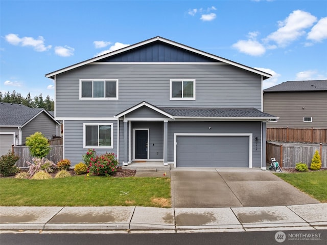 7810 22nd Trl SE, Lacey, WA 98503 - traditional home with driveway, an attached garage, cooling unit, and roof with shingles