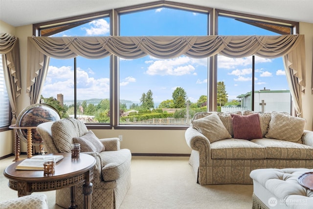 916 Kari Ln, Steilacoom, WA 98388 - sunroom / solarium with baseboards, carpet floors, and vaulted ceiling