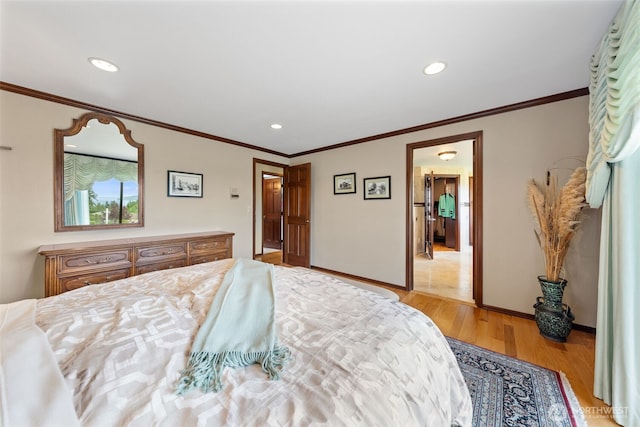 916 Kari Ln, Steilacoom, WA 98388 - bedroom featuring light wood finished floors, ornamental molding, baseboards, and recessed lighting
