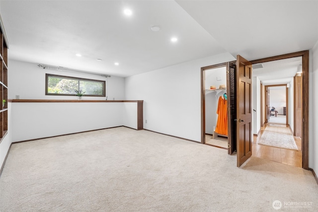 916 Kari Ln, Steilacoom, WA 98388 - spare room featuring carpet flooring, recessed lighting, and baseboards