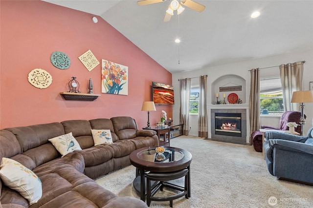 2557 Captains Ct, Ferndale, WA 98248 - carpeted living room featuring lofted ceiling, ceiling fan, a fireplace, and recessed lighting