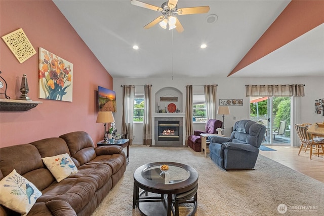 2557 Captains Ct, Ferndale, WA 98248 - living area with vaulted ceiling, ceiling fan, recessed lighting, a fireplace, and carpet